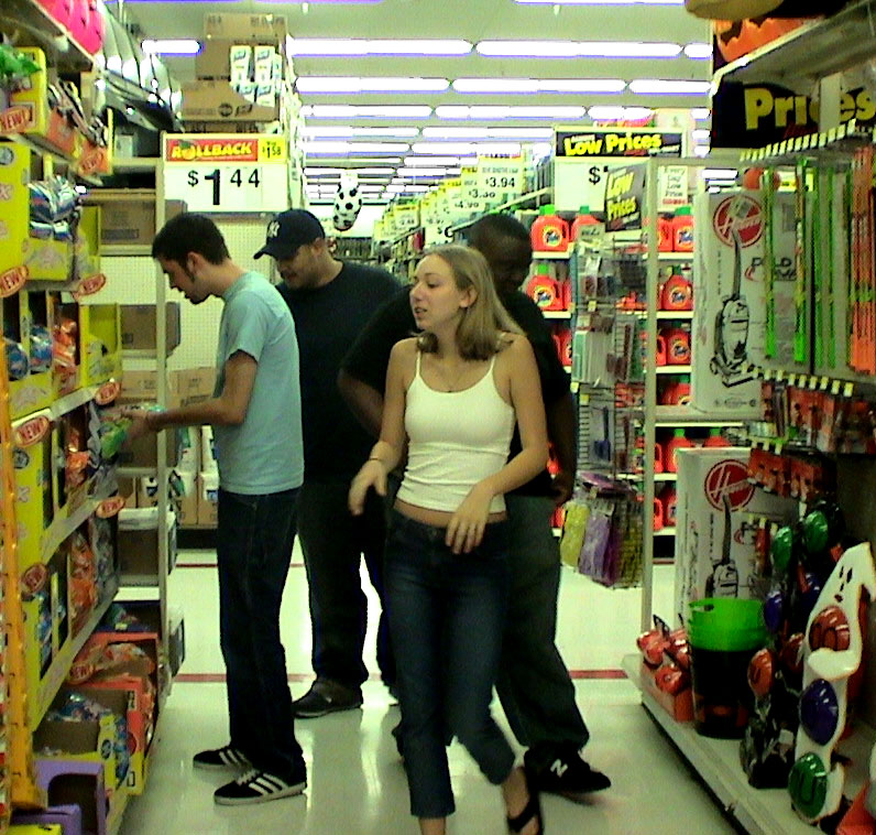L to R: Mike (band member), Jason (friend), Lisa (friend) and Shawn (band member) find the Halloween aisle.