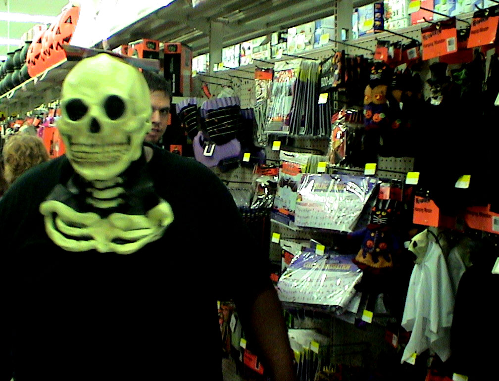 Shawn (in mask) and Mike (in background). The Halloween aisle rocks. 